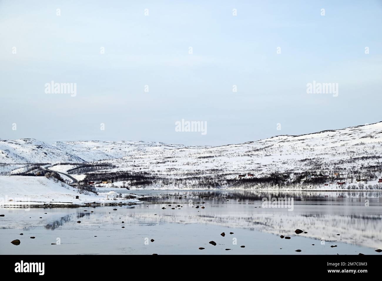 The settlement of Nesseby in the Varanger fjord near Kirkenes, far northern Norway. Stock Photo