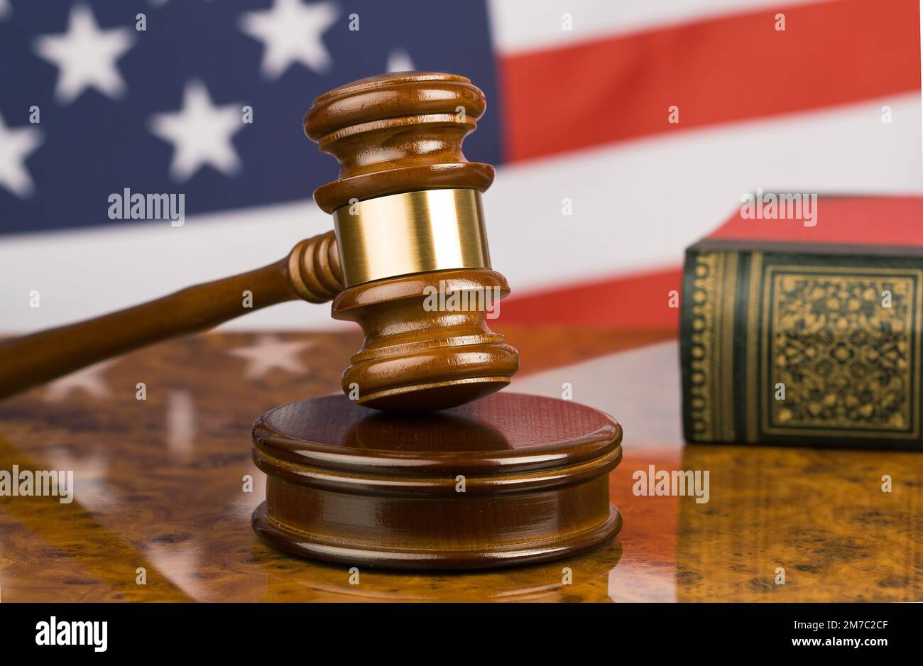 justice hammer and law code in front of USA flag, USA Stock Photo