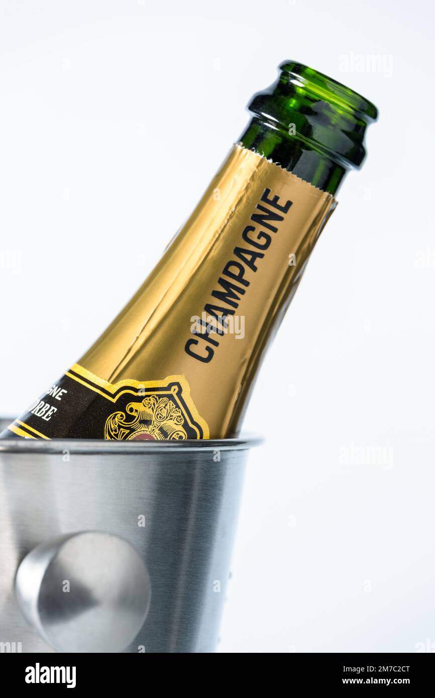 open champagne bottle in a champagne bucket Stock Photo