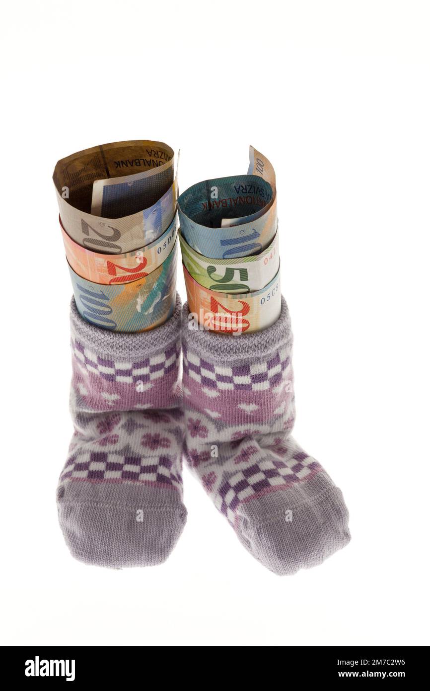 children's socks with Suisse francs, Switzerland Stock Photo