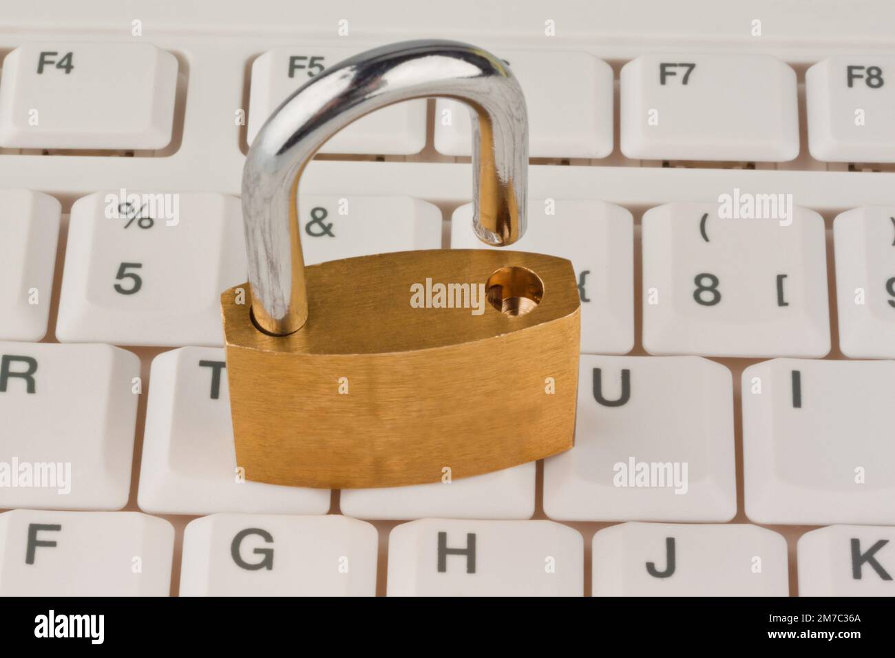 padlock on a keyboard, data security Stock Photo