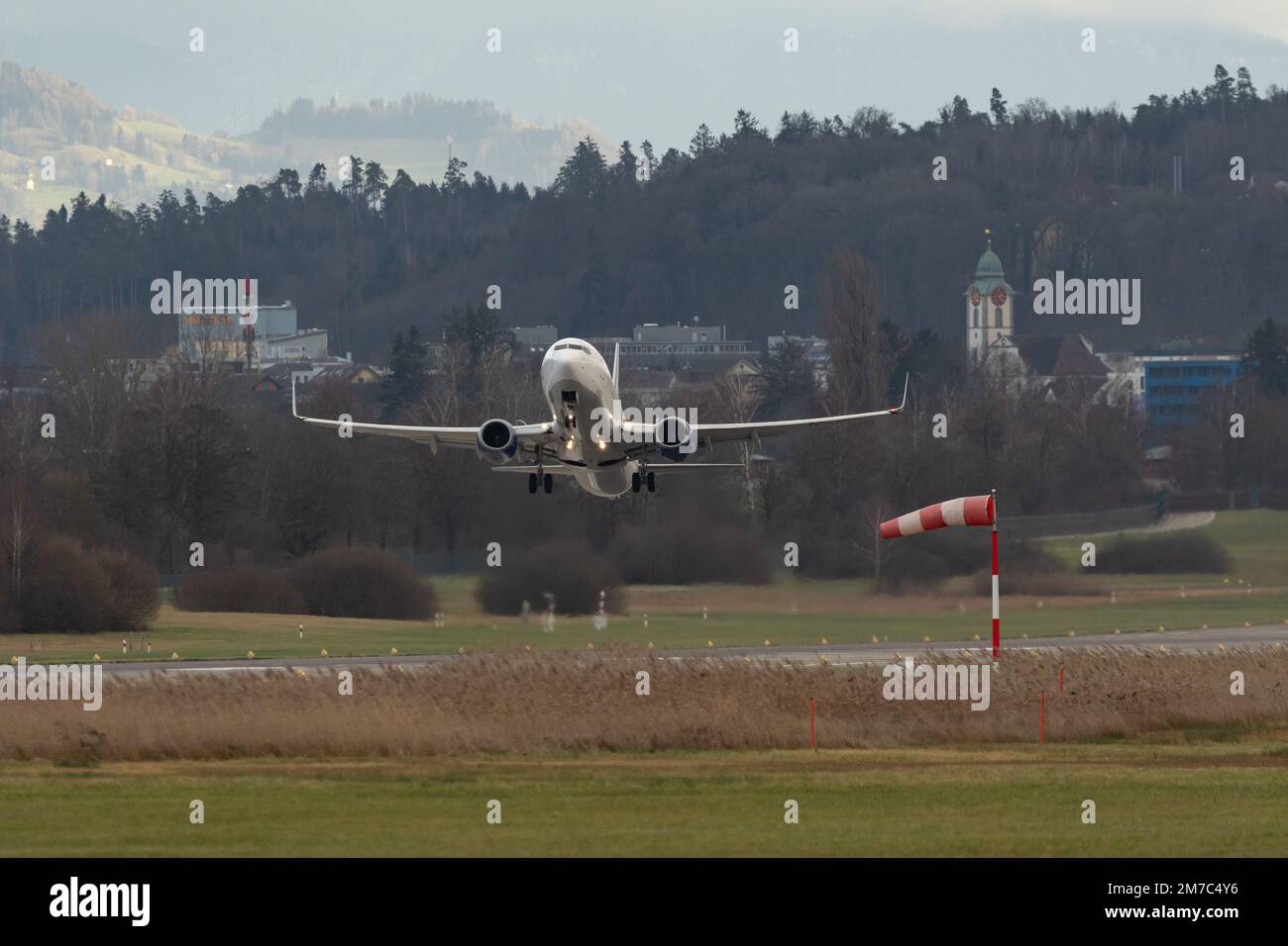 Zurich, Switzerland, December 23, 2022 Anadolu jet Boeing 737-8AS aircraft take off from runway 32 Stock Photo