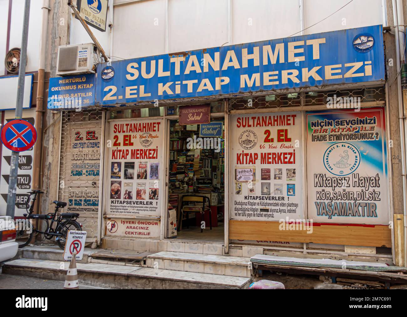 Signs and posters on store in historic Antalya. Sultanahmet store
