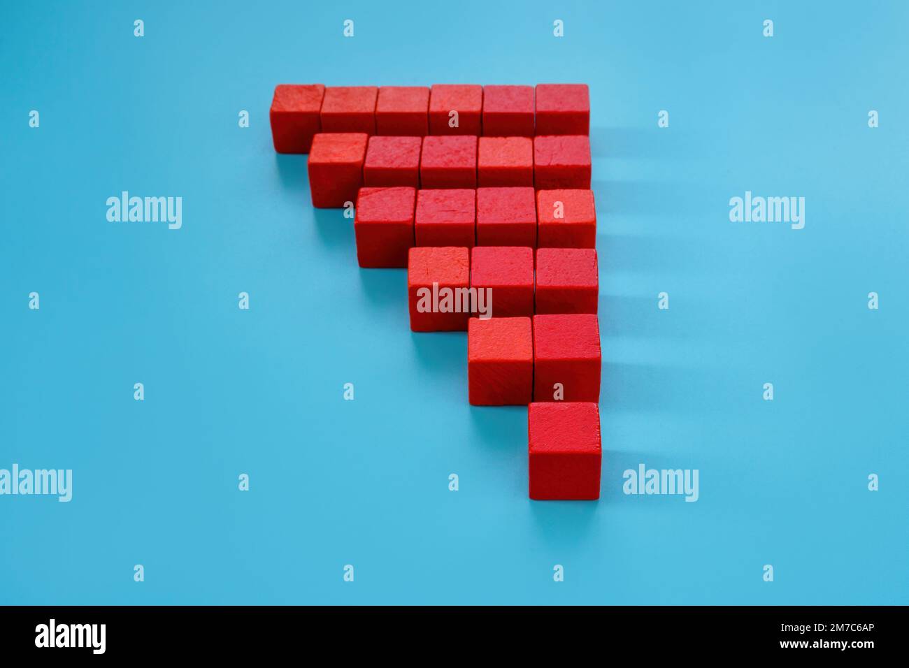Pyramid of red cubes as a concept of increase, growth or addition. Stock Photo