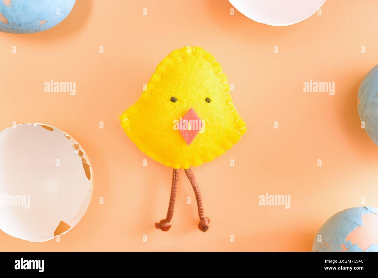Diy easter chicken in eggshell. concept. beige background. layout. Stock Photo
