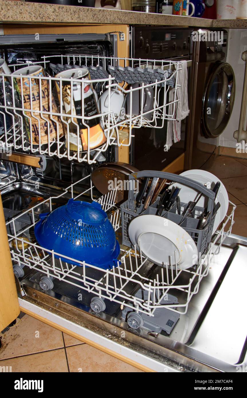 Dishwasher Is Filled With Dirty Dishes Stock Photo Alamy