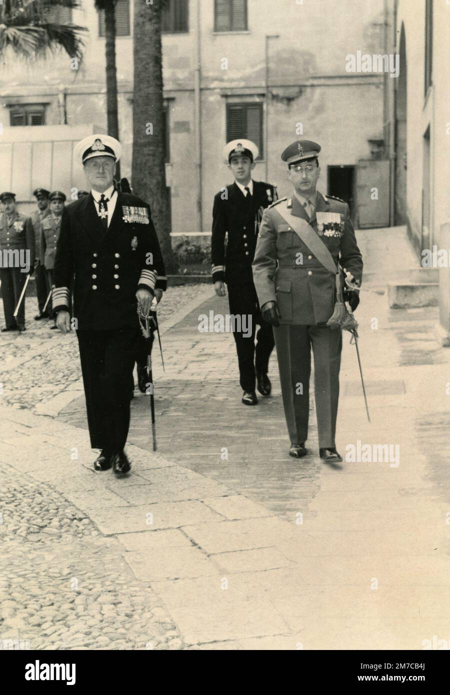 British Royal Navy Admiral Deric Holland-Martin (left) visiting Italian barracks, Italy 1963 Stock Photo
