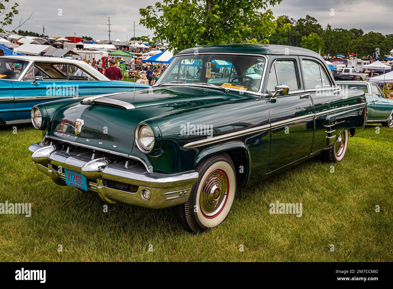 Iola, WI - July 07, 2022: High perspective front corner view of a 1953 Mercury Monterey 4 Door Sedan at a local car show. Stock Photo