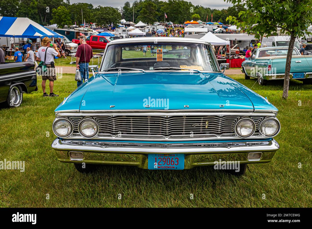 Iola, WI - July 07, 2022: High perspective front view of a 1964 Ford Galaxie 500 2 Door Hardtop at a local car show. Stock Photo