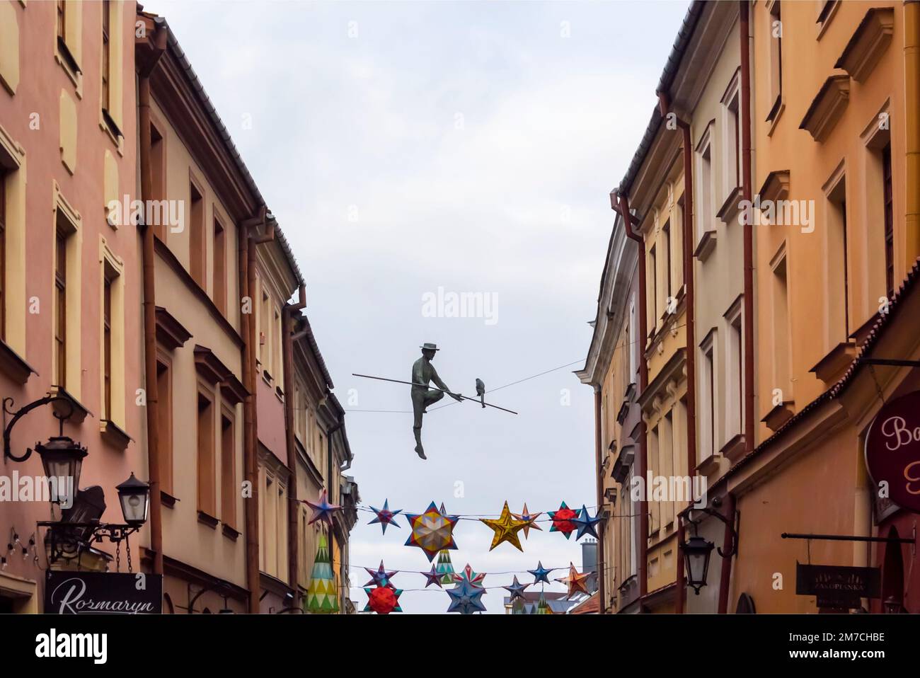 Lublin, Poland - December 2022: Image of sculpture of tightrope walker Jasha Mazur. Stock Photo