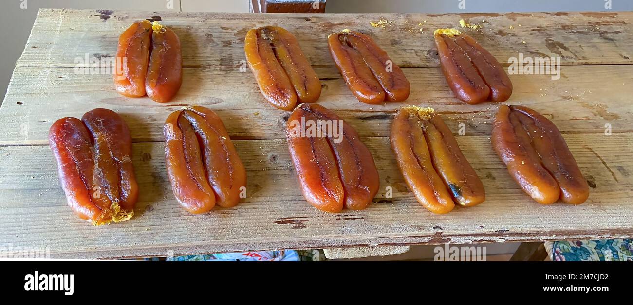 Bottarga, cured fish roe of grey mullet on white background Stock Photo