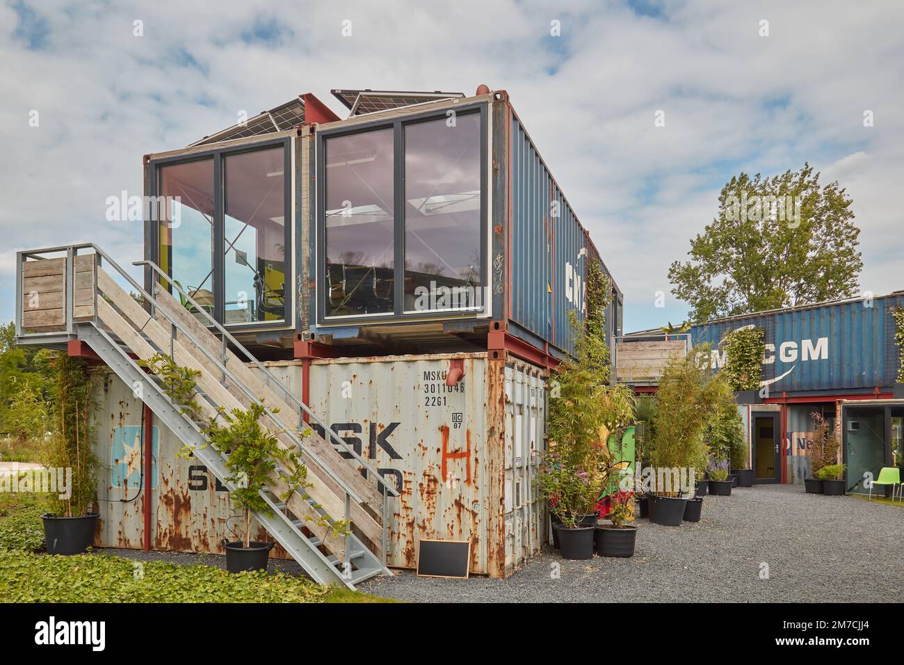 Almere, The Netherlands - April 21, 2022: Tiny offices made of used steel cargo containers in Almere, The Netherlands Stock Photo