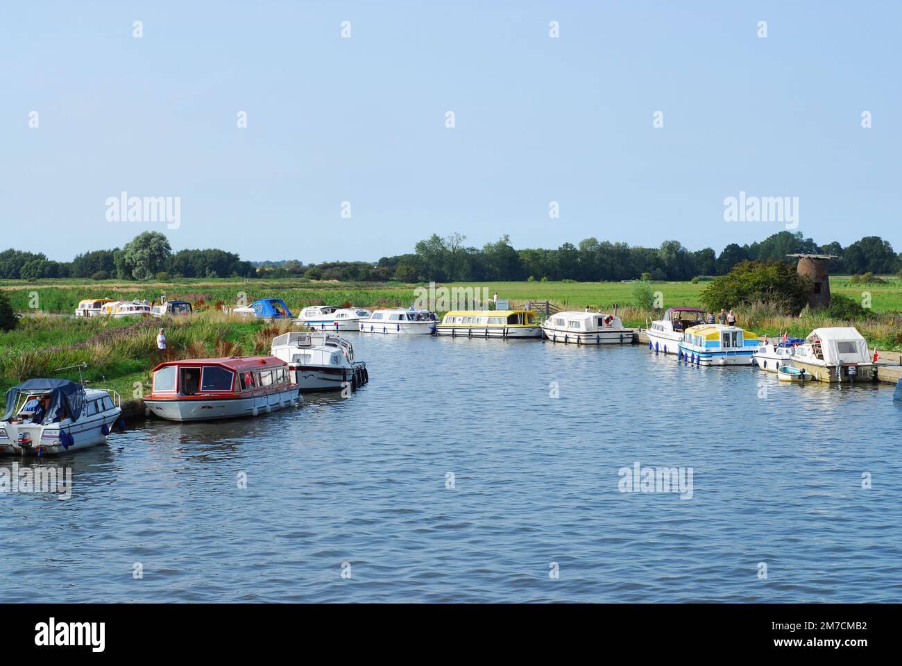 Boats on the River Ant at Ludham Bridge, Norfolk, East Anglia UK, in summertime Stock Photo