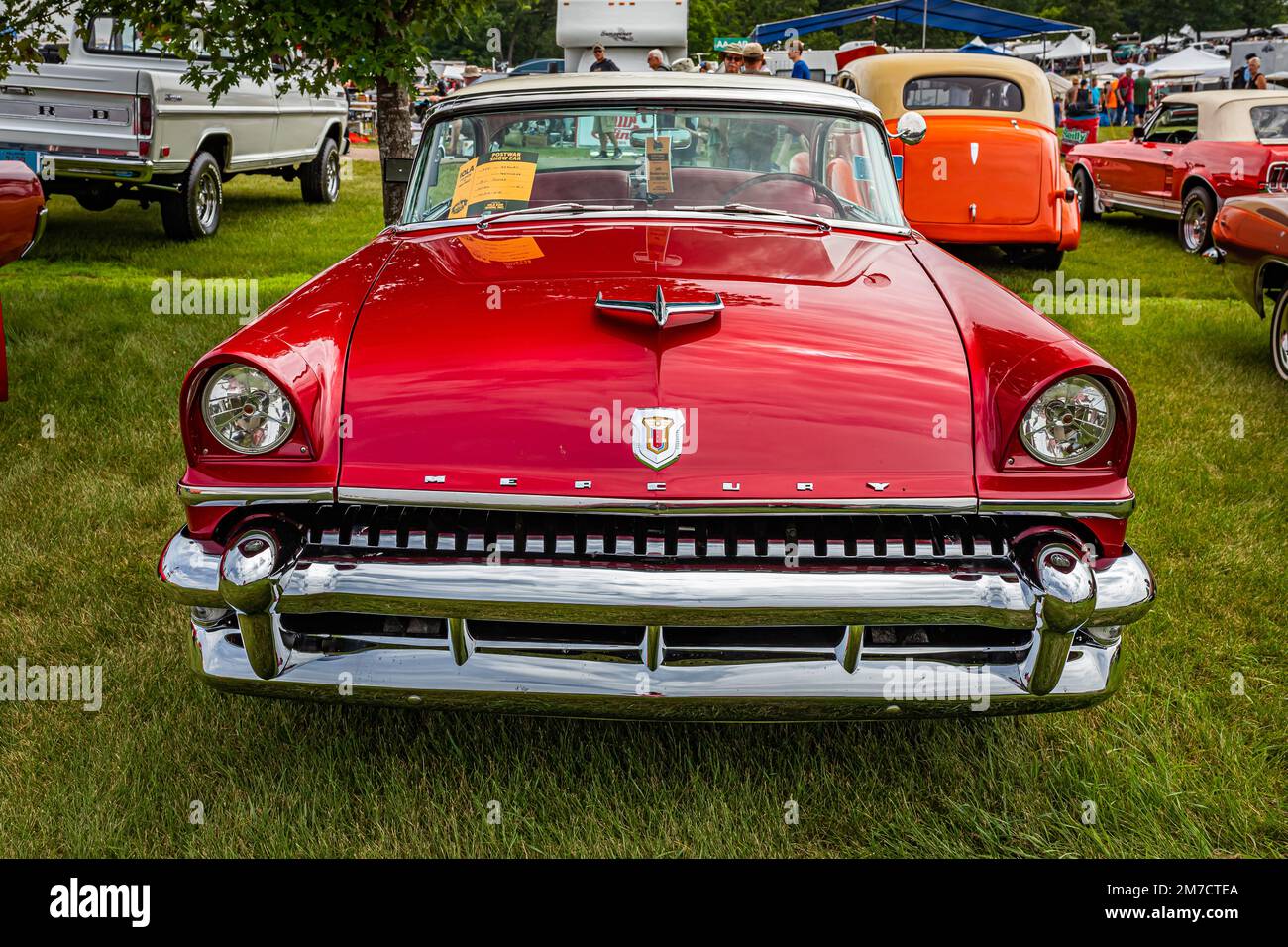 Iola, WI - July 07, 2022: High perspective front view of a 1955 Mercury Montclair Hardtop Coupe at a local car show. Stock Photo