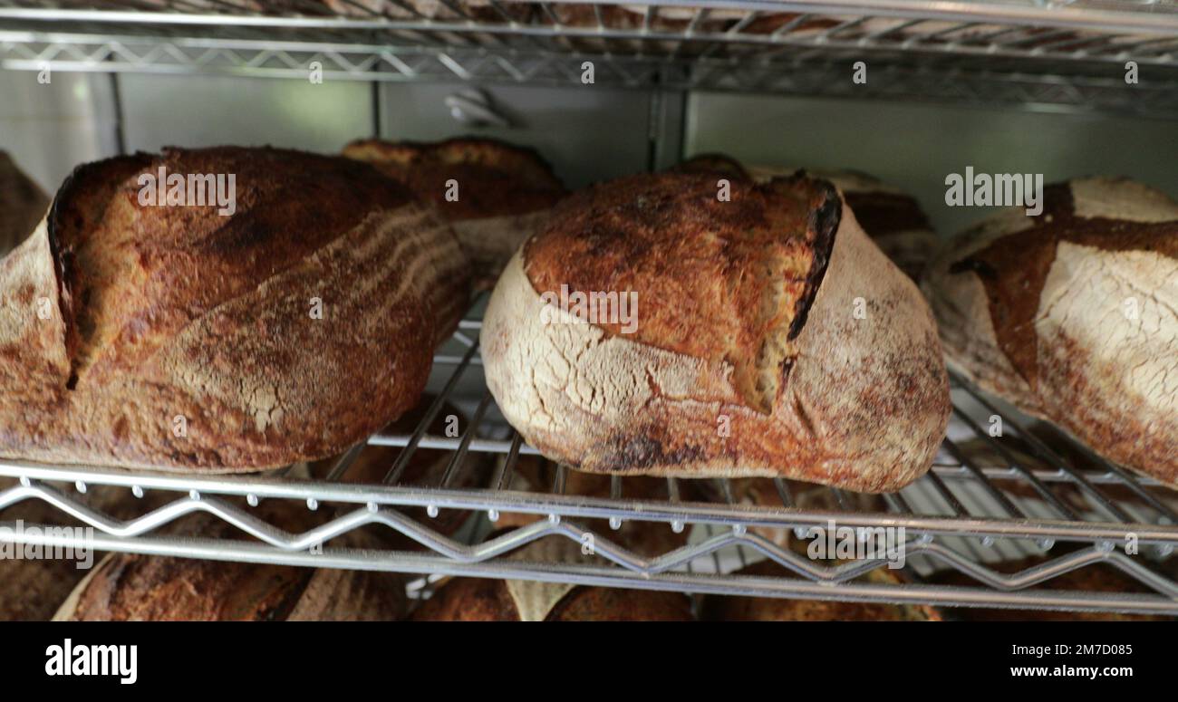 Traditional breads stacked together on shelf at bakery4 Stock Photo Alamy