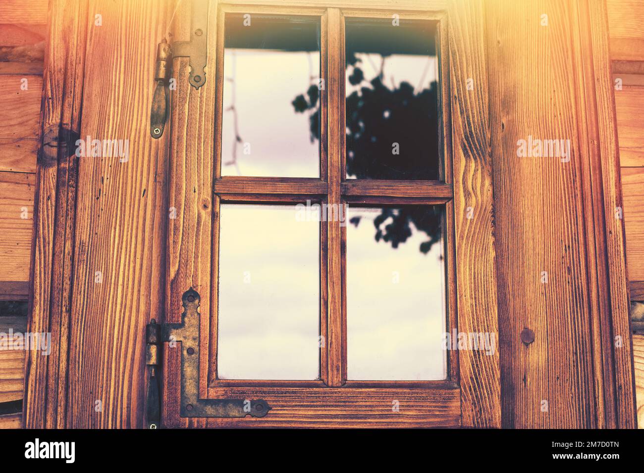 Nicely decorated window of a log cabin house Stock Photo - Alamy
