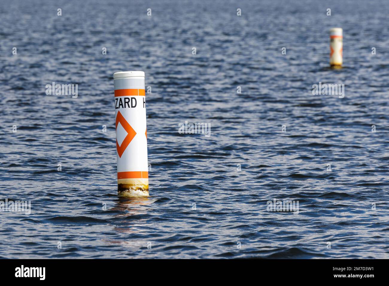 Hazard safety buoy alerting boaters to navigation danger. Nautical