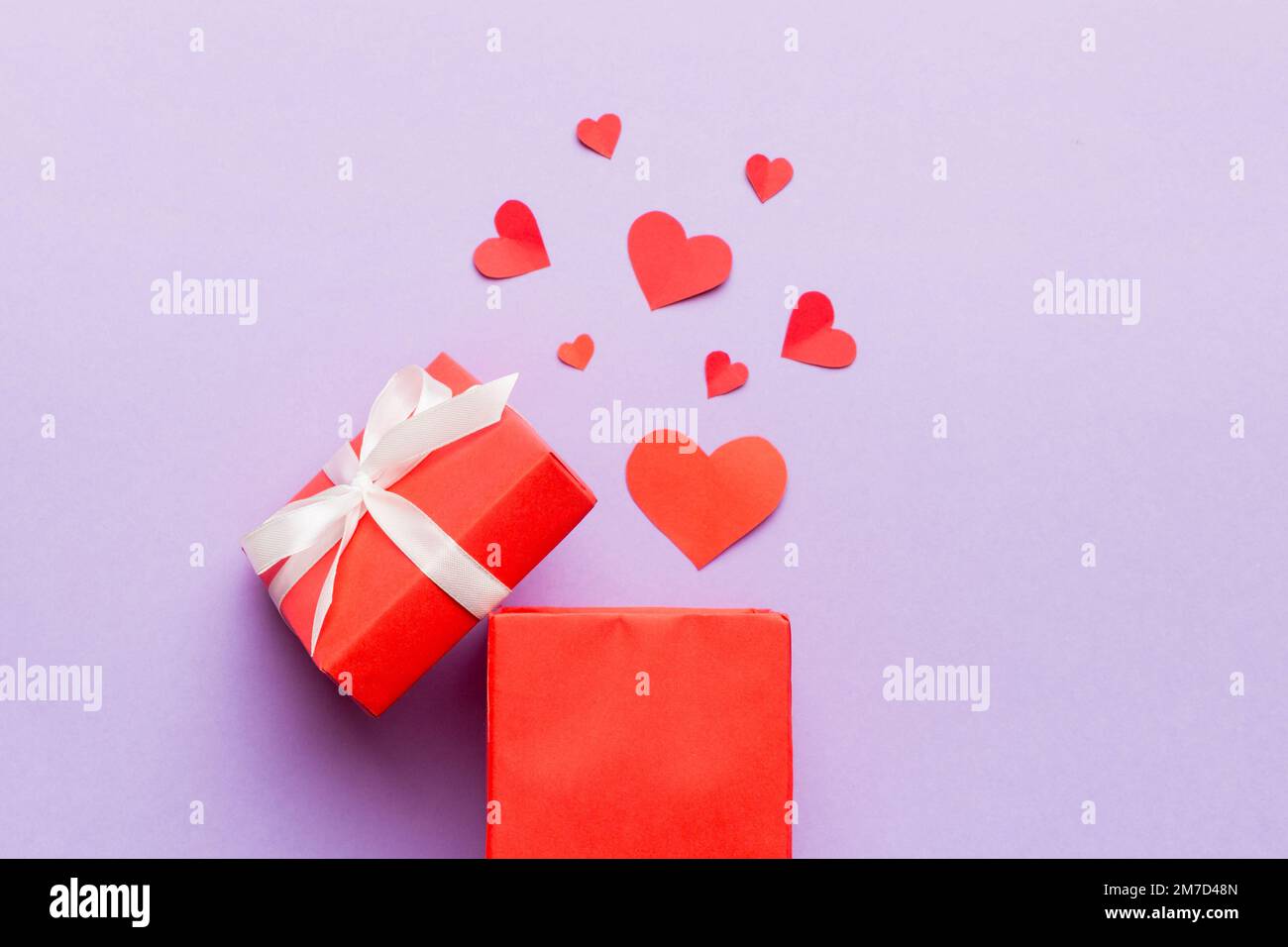 Happy valentines day opened heart shape gift box with small hearts, on ...