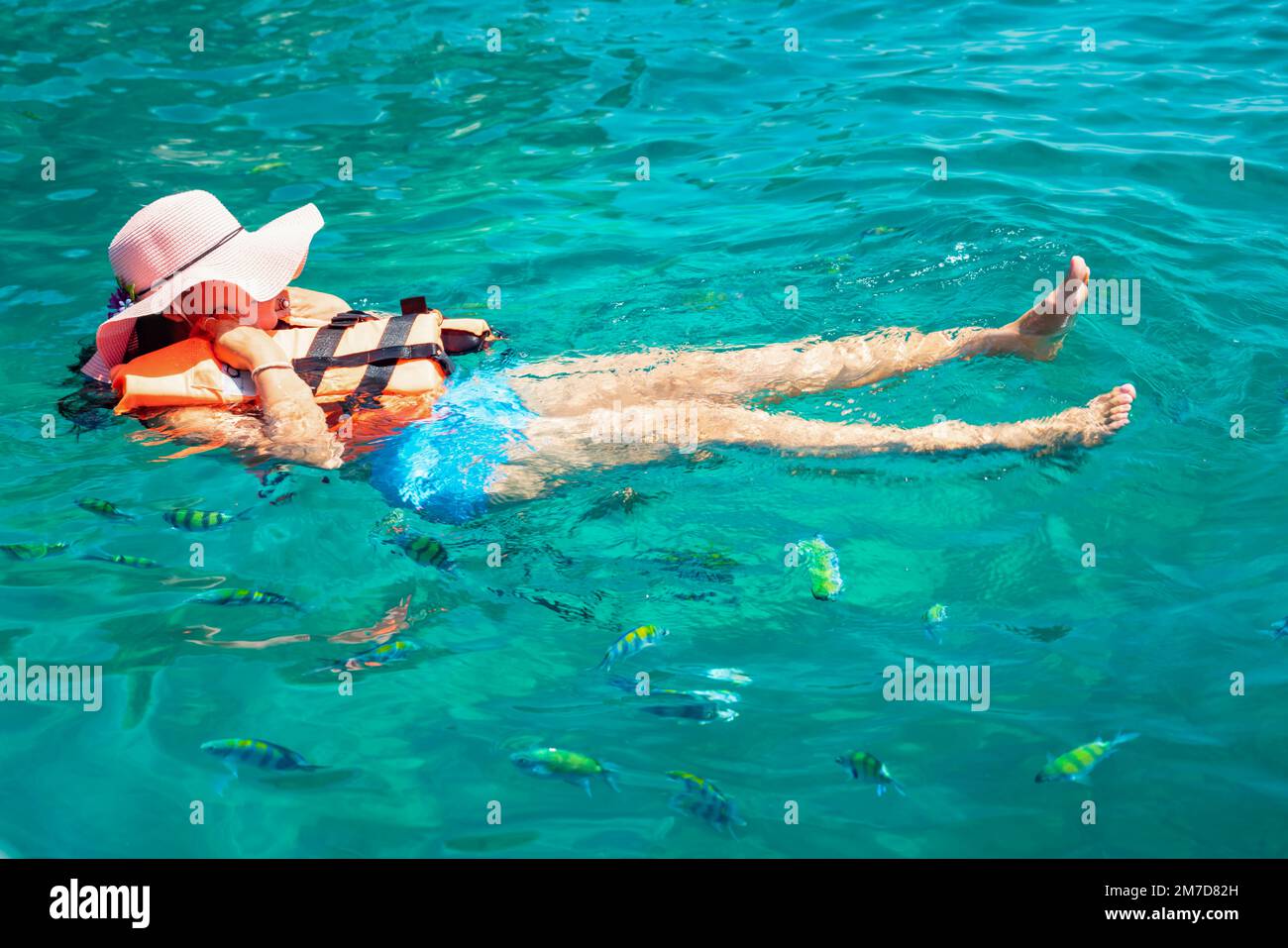 Woman swimming sea fish hi-res stock photography and images - Alamy