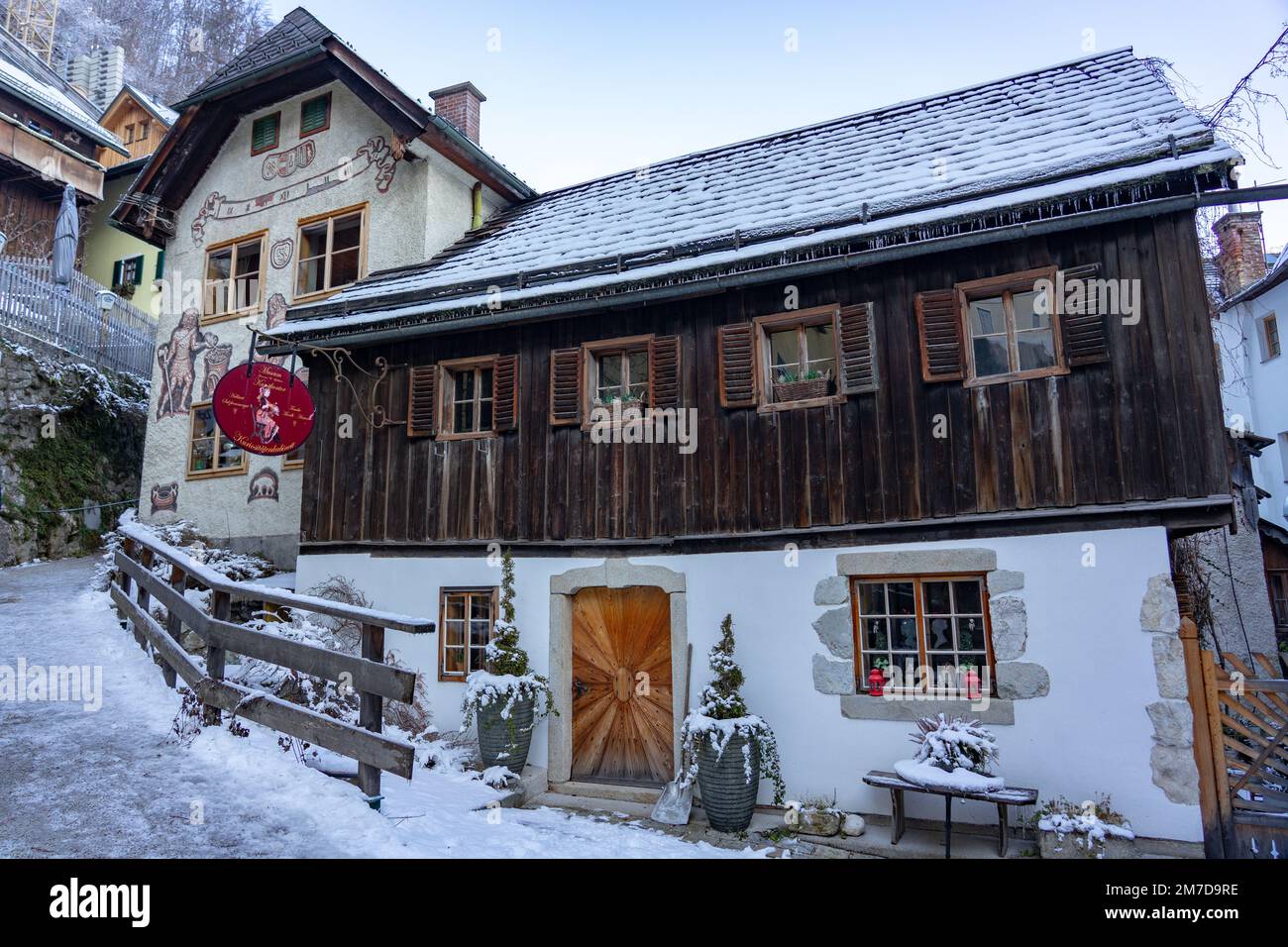 12.10.2022 - Hallstatt, Austria: Idillic traditional rustic building exterior in Hallstatt Austria with wooden details . Stock Photo