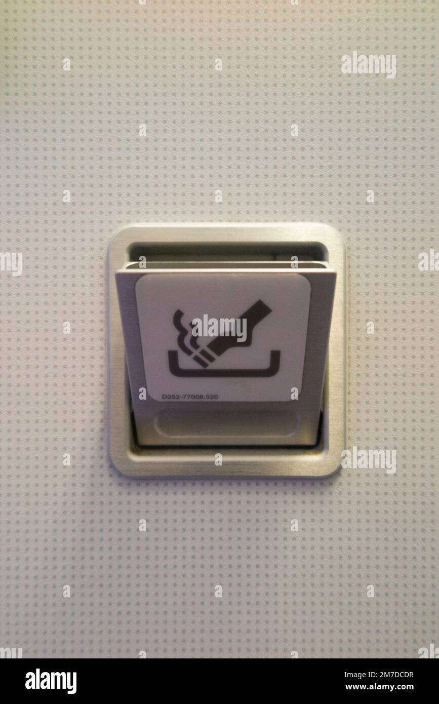 Ash tray / ashtray and No Smoking sign in toilet / loo / lavatory / WC