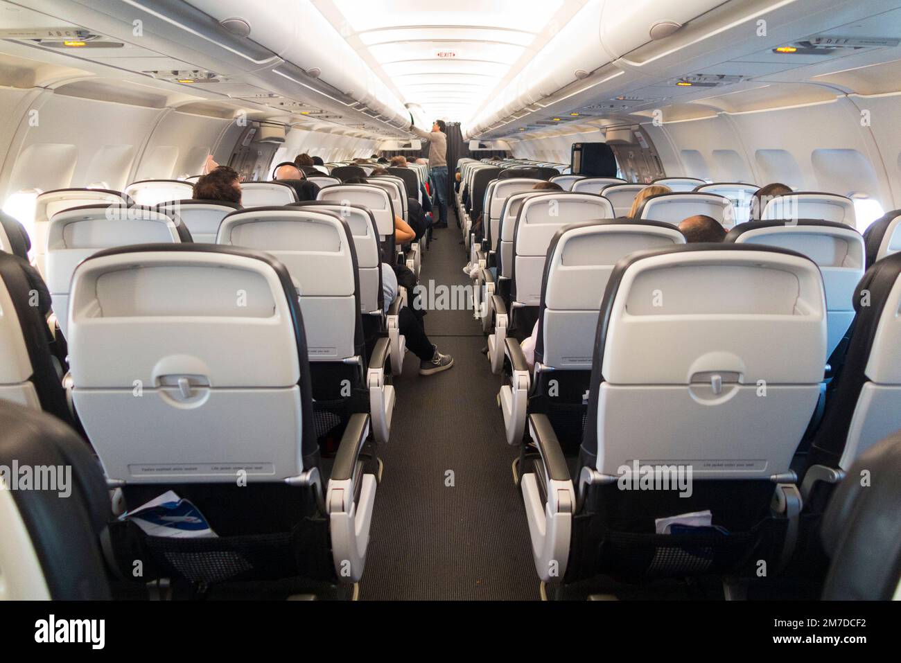 The aisle on a on a BA Airbus A321 plane / airplane / aeroplane / air plane during flight. (133) Stock Photo