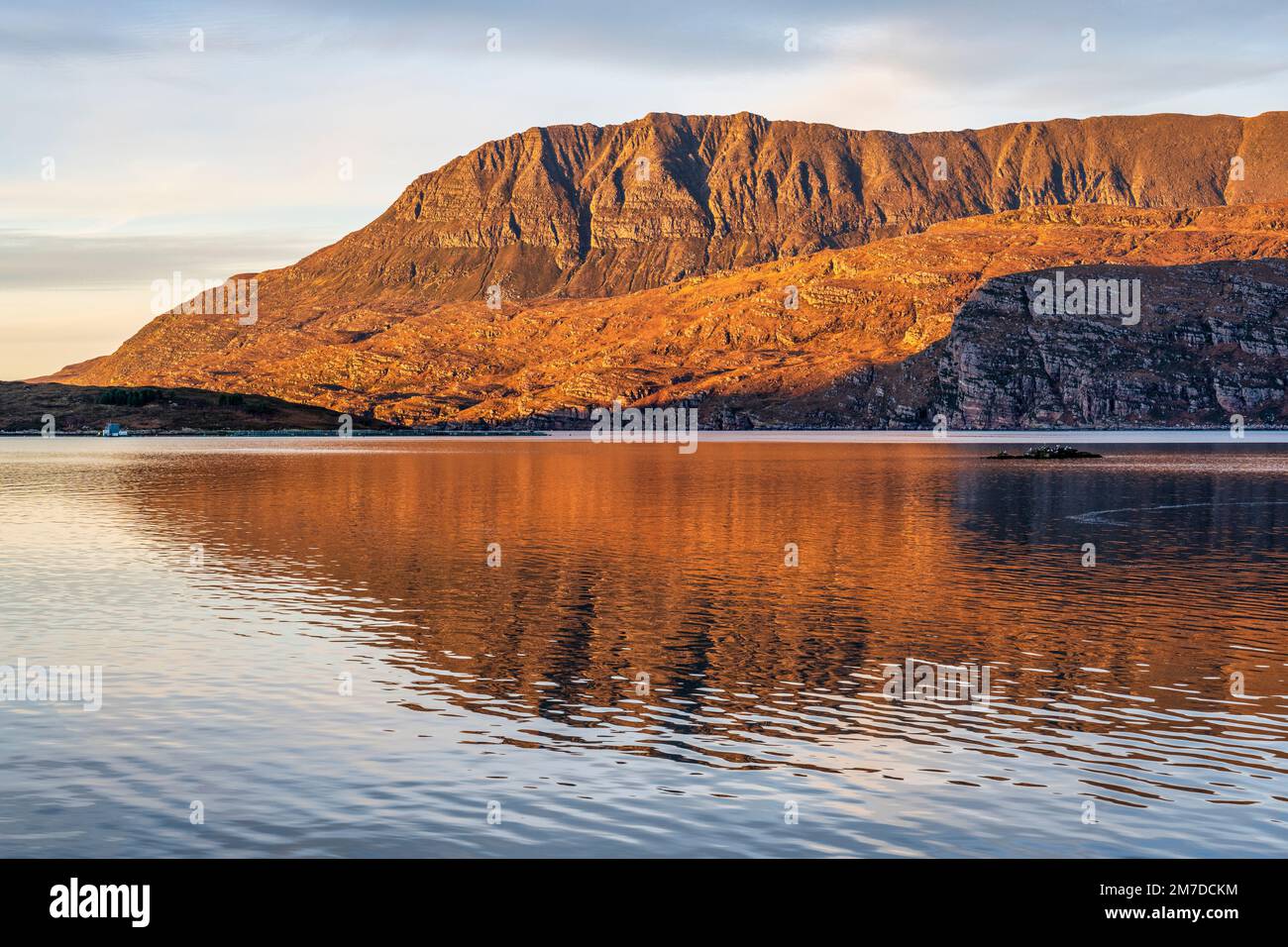 View across Loch Canaird to Ben Mor Coigach, with Isle Martin, a nature reserve, on the left - Coigach Peninsula, Wester Ross, Highland, Scotland, UK Stock Photo