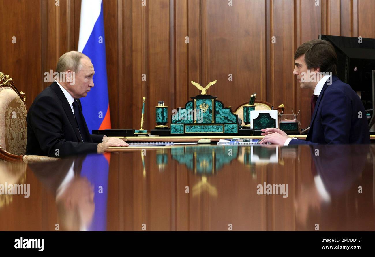 Moscow, Russia. 09th Jan, 2023. Russian President Vladimir Putin holds a face-to-face meeting with Minister of Education Sergei Kravtsov, right, at the Kremlin office, January 9, 2023 in Moscow, Russia. Credit: Mikhail Klimentyev/Kremlin Pool/Alamy Live News Stock Photo