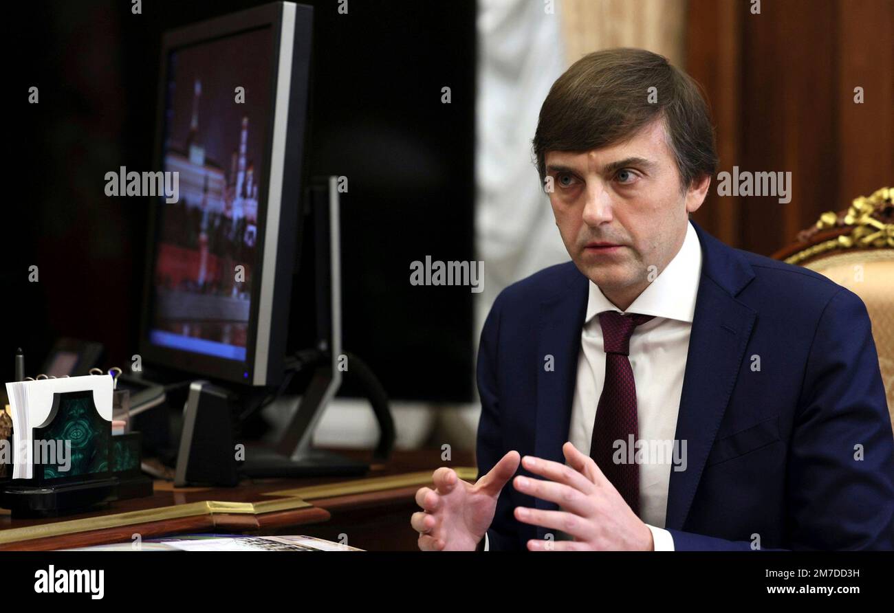 Moscow, Russia. 09th Jan, 2023. Russian Minister of Education Sergei Kravtsov, right, responds during a face-to-face meeting with President Vladimir Putin at the Kremlin office, January 9, 2023 in Moscow, Russia. Credit: Mikhail Klimentyev/Kremlin Pool/Alamy Live News Stock Photo
