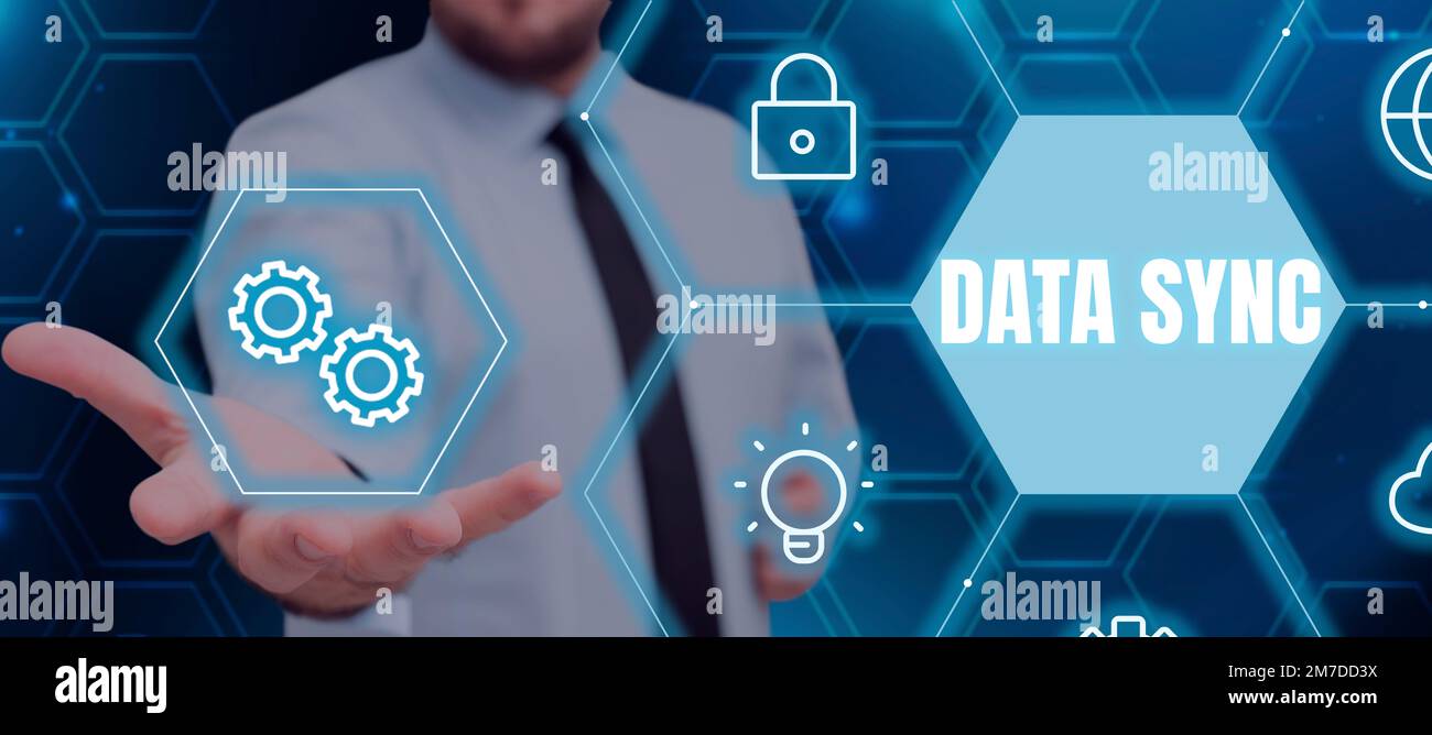 Writing displaying text Data Sync. Concept meaning data that is continuously generated by different sources Stock Photo