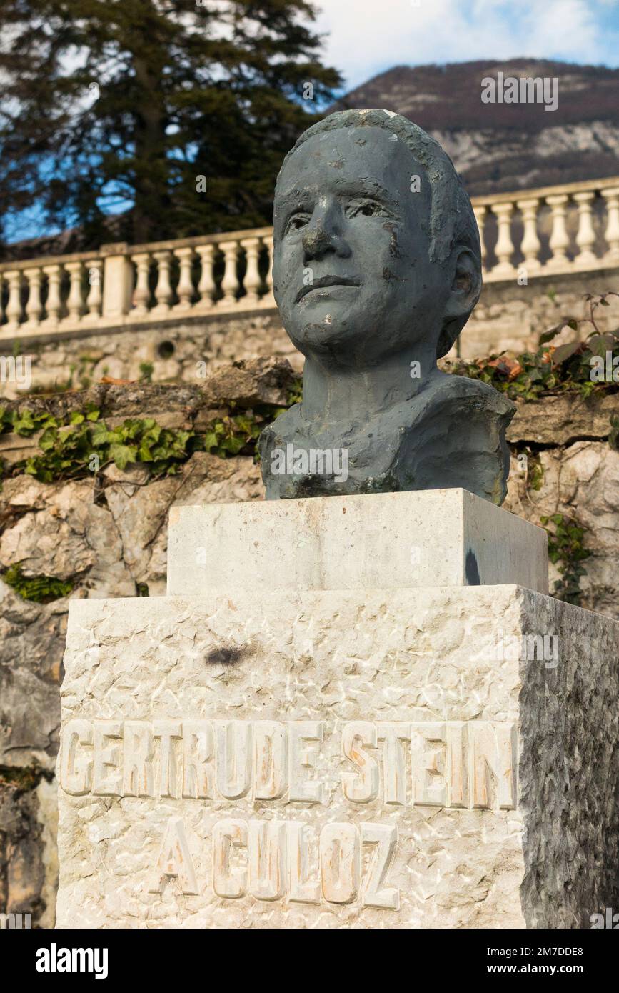 A bust portrait statue sculpture of Gertrude Stein (February 3, 1874 – July 27, 1946) an American novelist, poet, playwright, and art collector. Born in Pittsburg, later living in Culoz (as a Jew living in nazi occupied) France. The statue is situated in gardens Culoz in France. (133) Stock Photo