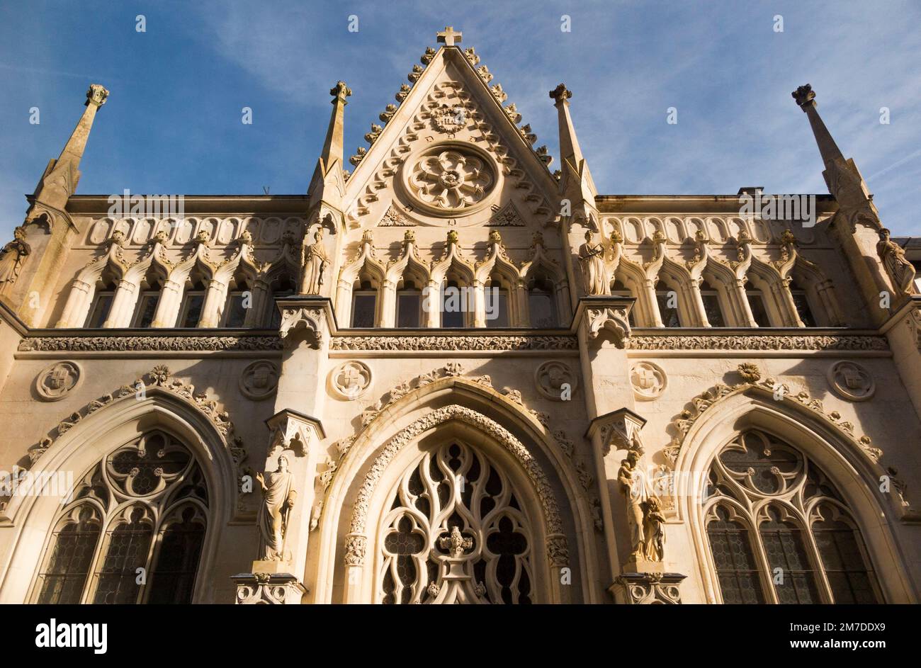 Recently restored and cleaned stone carving and stonework above the Abbey-church entrance of Hautecombe Abbey in Saint-Pierre-de-Curtille near Aix-les-Bains in Savoy, France. (133) Stock Photo