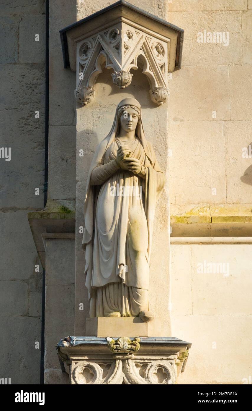 Recently restored and cleaned stone carving & stonework including statues of saints, part of the exterior front facade of Abbey-church of Hautecombe Abbey in Saint-Pierre-de-Curtille near Aix-les-Bains in Savoy. France. (133) Stock Photo