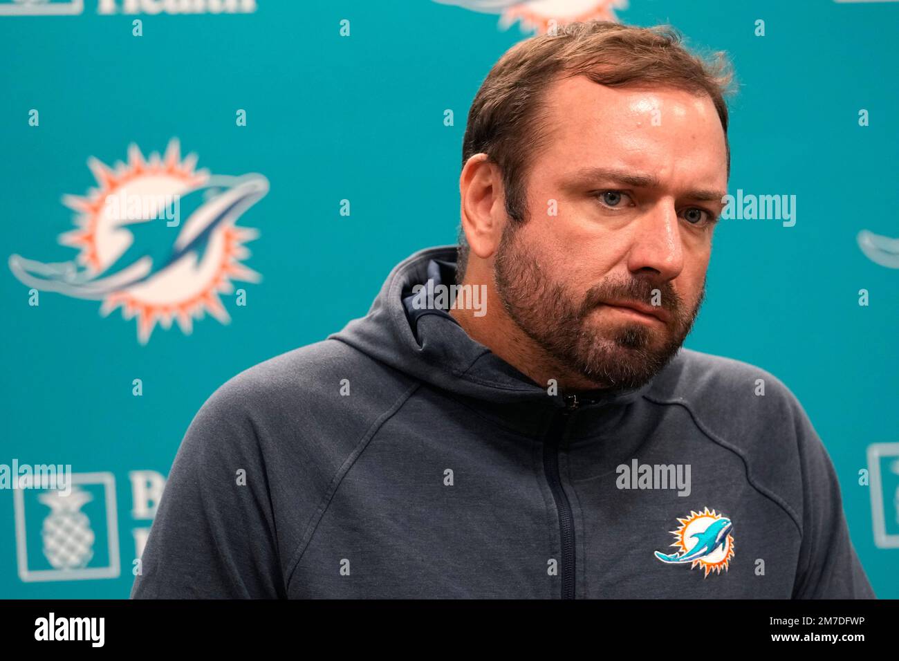 Miami Dolphins offensive coordinator Frank Smith speaks during a media