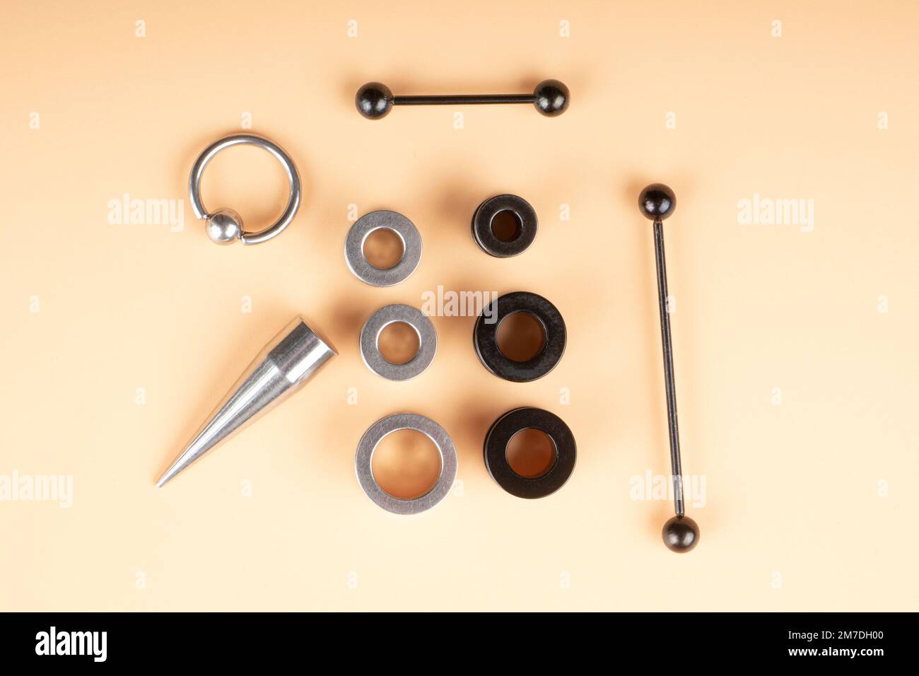piercing set, metal accessories for piercing the skin of the ears Stock