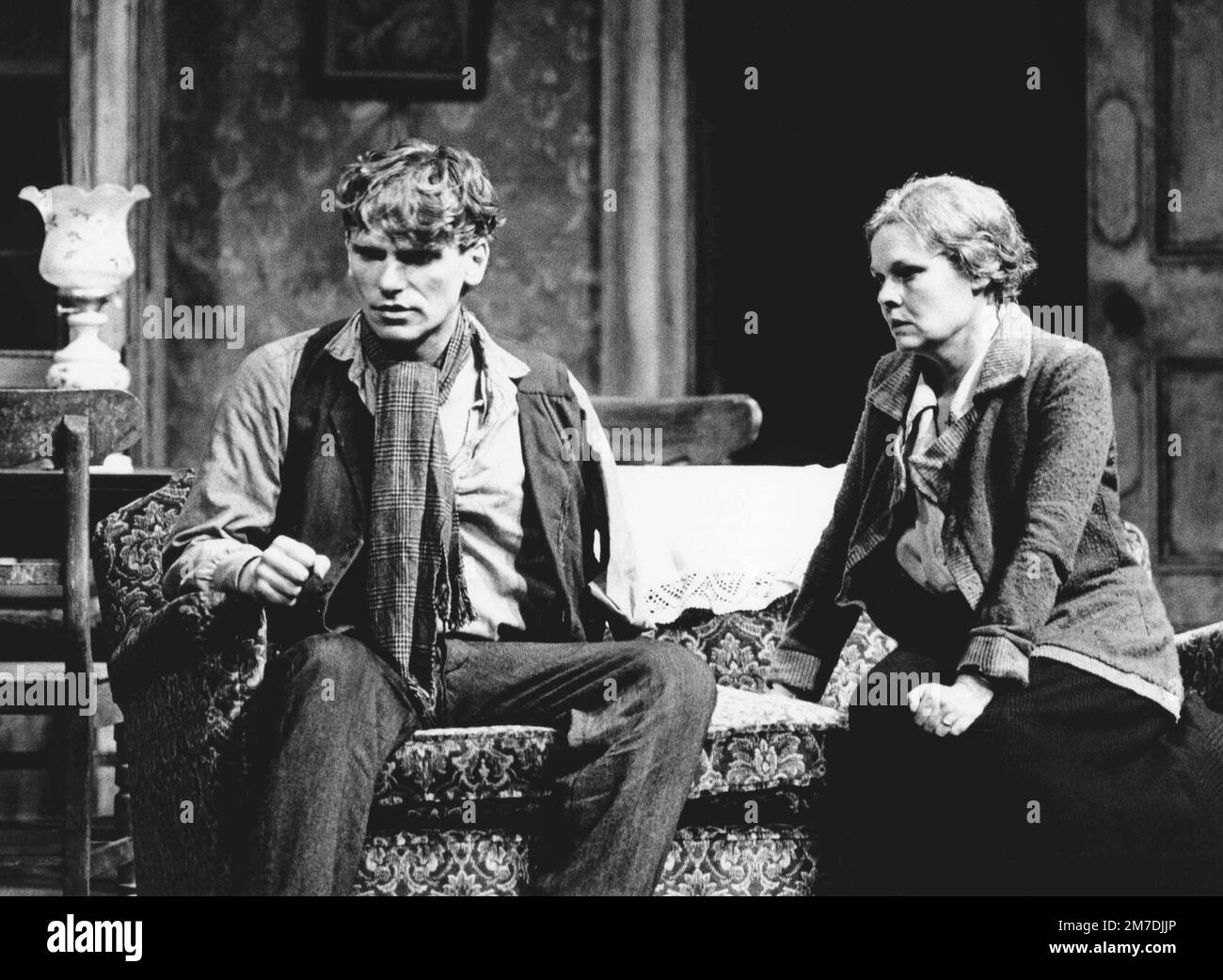 Gerard Murphy (Johnny Boyle), Judi Dench (Juno) in JUNO AND THE PAYCOCK by Sean O'Casey at the Royal Shakespeare Company (RSC), Aldwych Theatre, London WC2  07/10/1980  set design: John Gunter  costumes: Lindy Hemming  lighting: David Hersey  director: Trevor Nunn Stock Photo