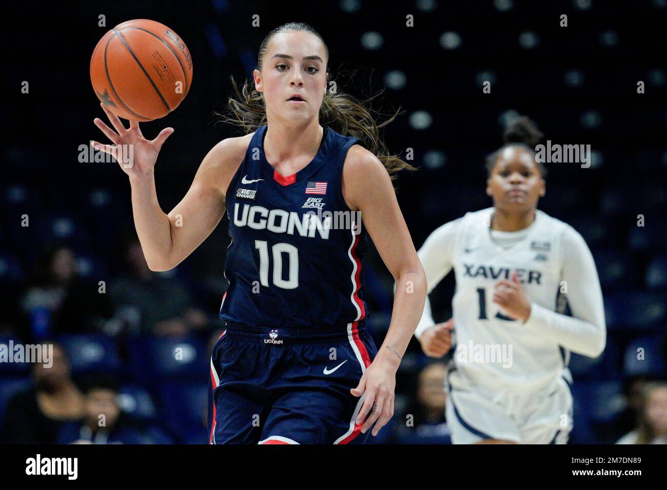 UConn guard Nika Muhl (10) dribbles during the second half of an NCAA ...