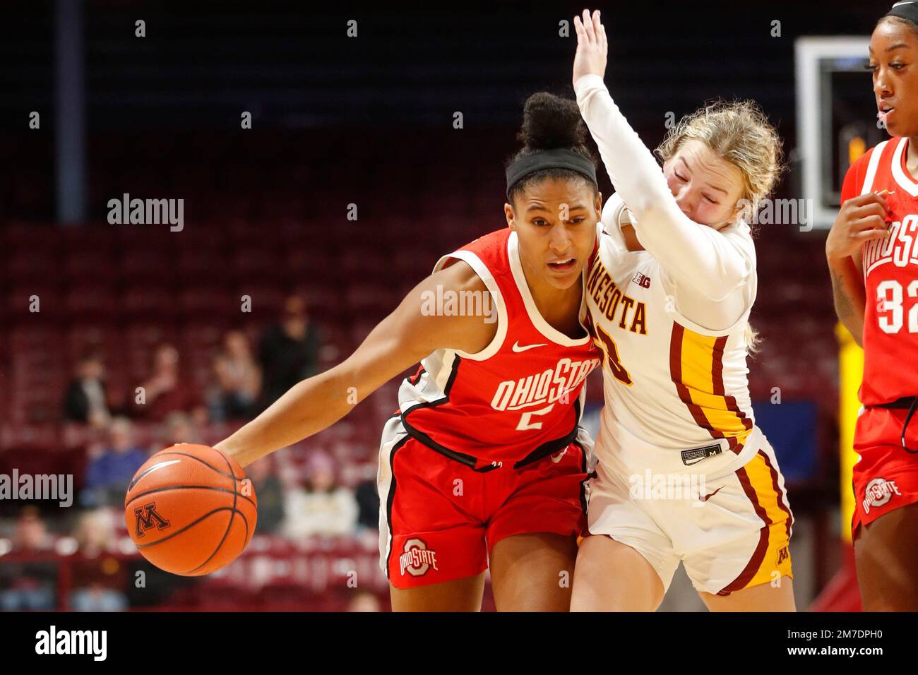 Ohio State forward Taylor Thierry (2) drives past Minnesota guard Katie ...