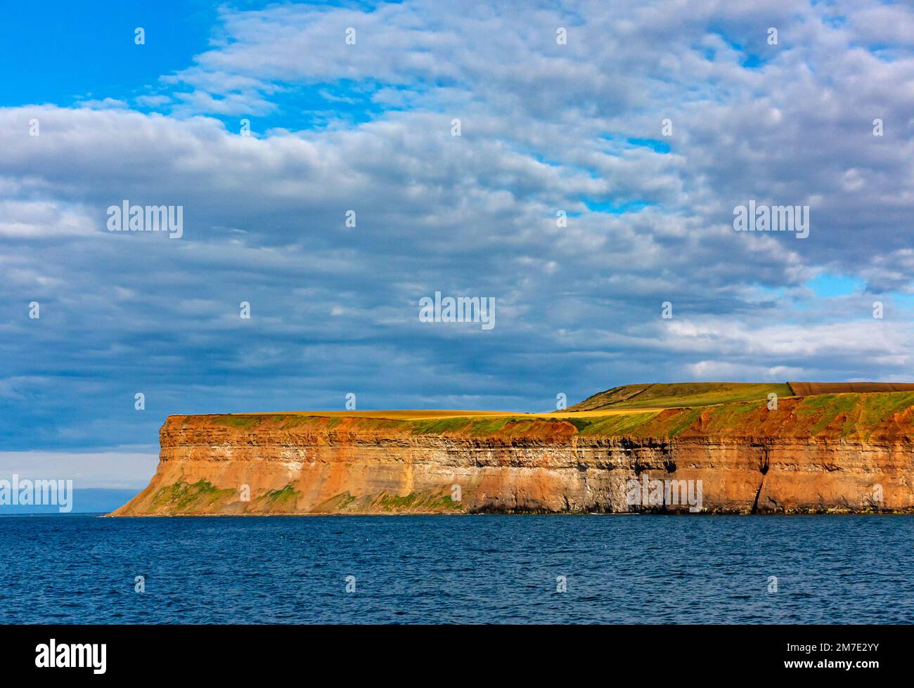 Summer view of the sea and cliffs to the south of Saltburn-by-the-Sea near Redcar in NorthYorkshire England UK Stock Photo