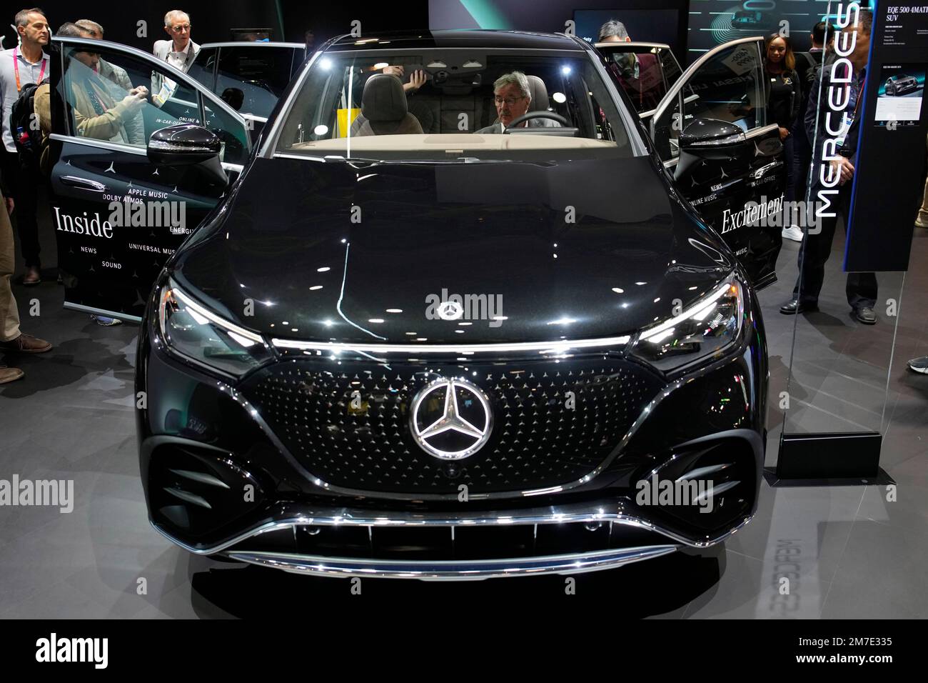 People view the Mercedes-Benz EQE 4MATIC SUV during the CES tech show ...