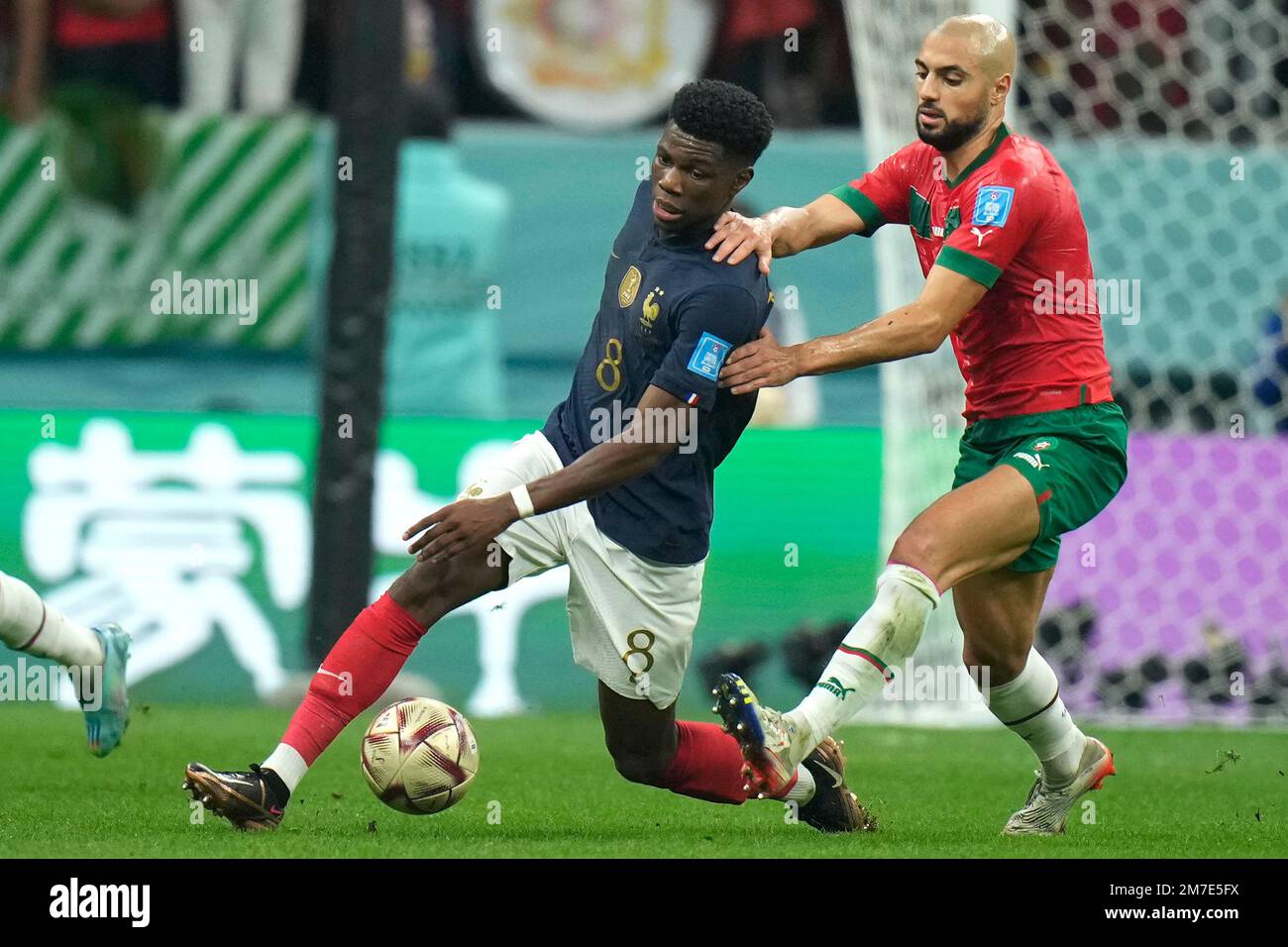 France's Aurelien Tchouameni, left, challenges for the ball with