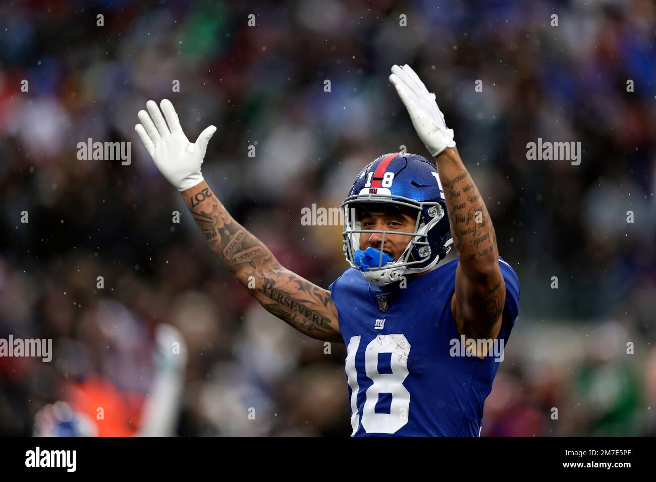 New York Giants wide receiver Isaiah Hodgins (18) reacts against the