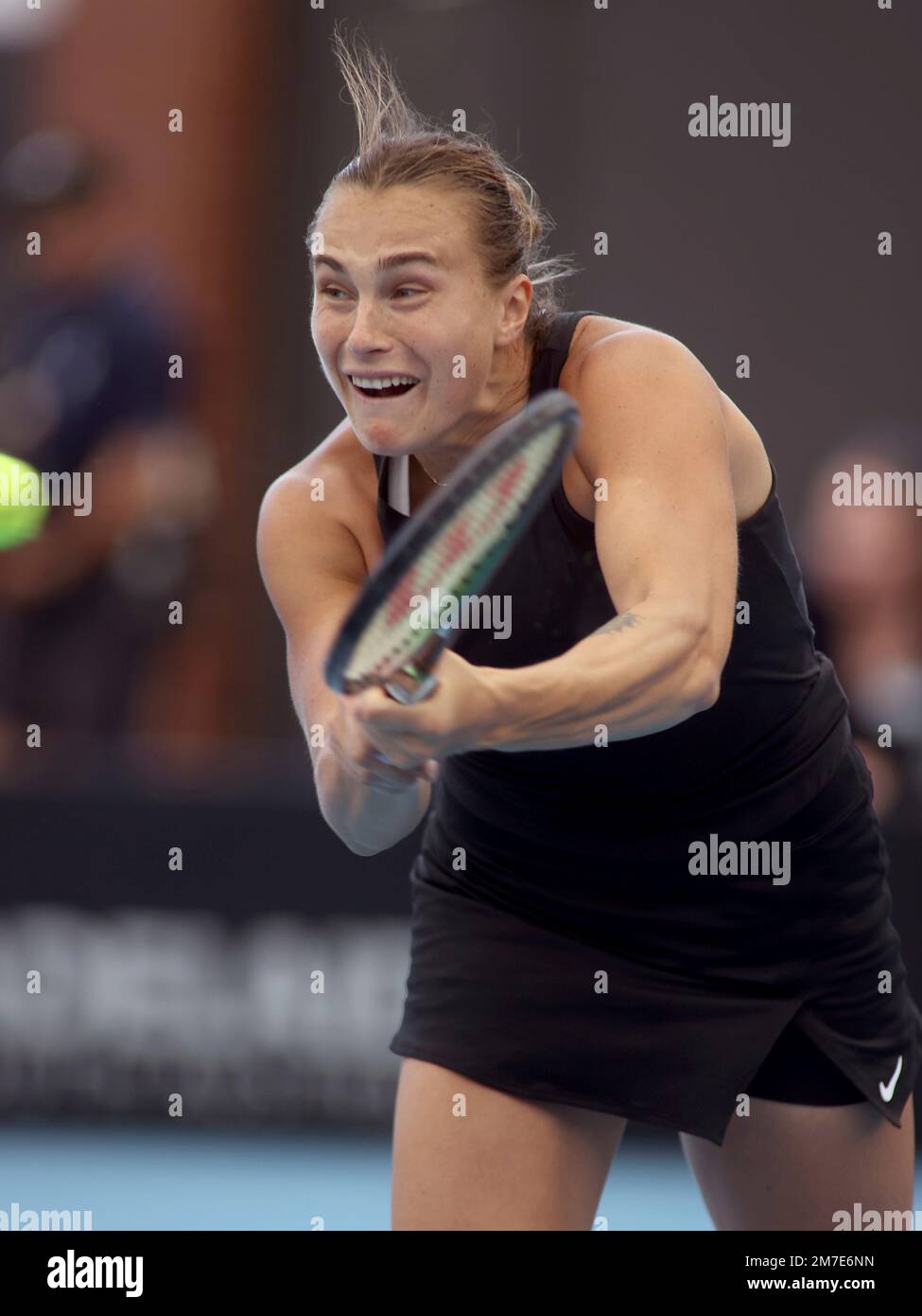 Belarus' Aryna Sabalenka makes a backhand return to Romania's Irina