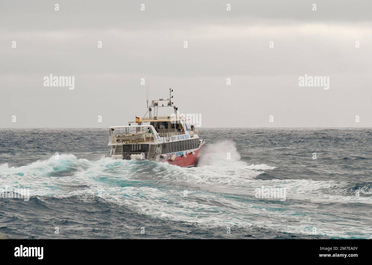 La Graciosa ferry between the waves Stock Photo