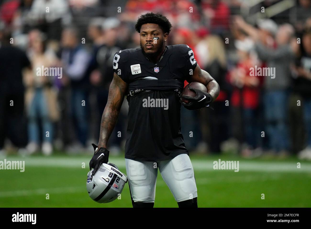 Las Vegas Raiders running back Josh Jacobs warms up before the start of an  NFL football game between the Las Vegas Raiders and Kansas City Chiefs  Saturday, Jan. 7, 2023, in Las