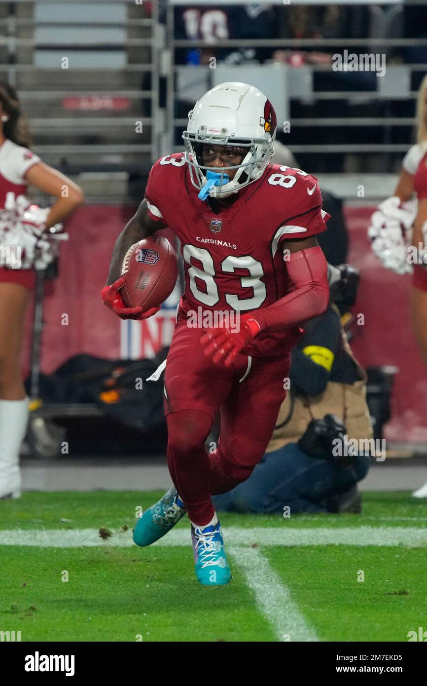 Arizona Cardinals wide receiver Greg Dortch (83) runs the ball during the  first half of an NFL football game against the New England Patriots,  Monday, Dec. 12, 2022, in Glendale, Ariz. (AP