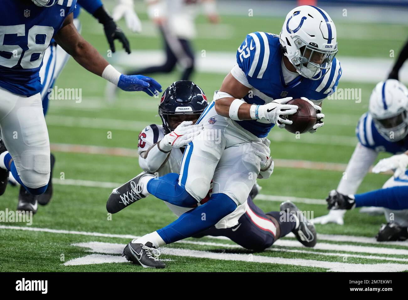 Houston Texans running back Royce Freeman (26) tackles Indianapolis Colts  safety Julian Blackmon during the first half of an NFL football game  between the Houston Texans and Indianapolis Colts, Sunday, Jan. 8,