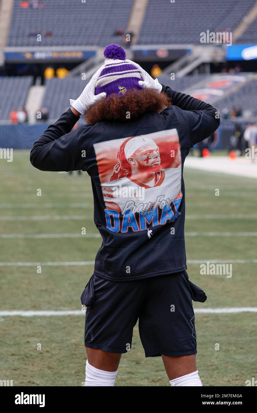 Minnesota Vikings wide receiver Justin Jefferson wears a shirt honoring  injured Buffalo Bills player Damar Hamlin before an NFL football game  against the Chicago Bears, Sunday, Jan. 8, 2023, in Chicago. (AP