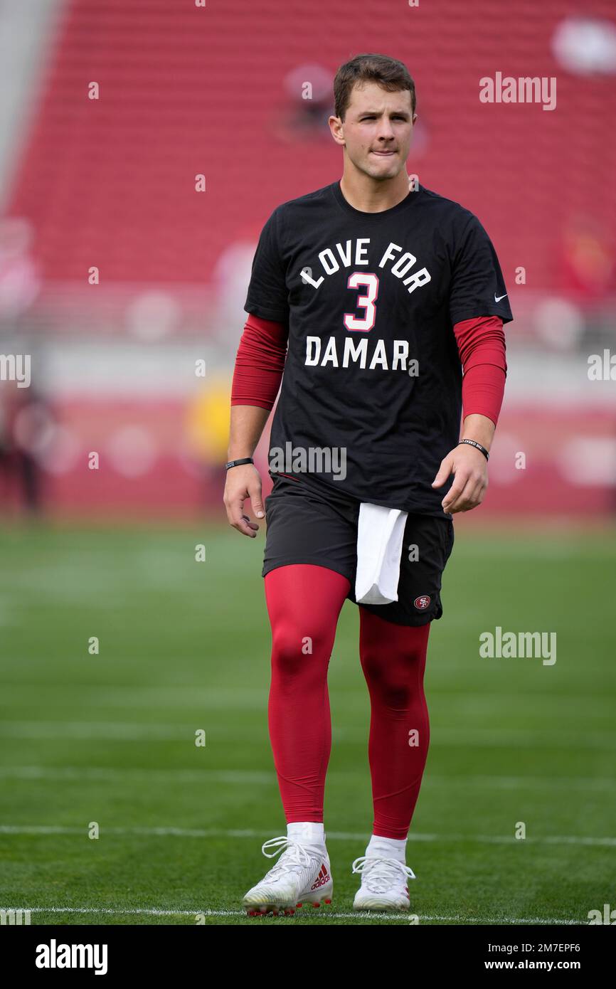 San Francisco 49ers quarterback Brock Purdy wears a shirt for