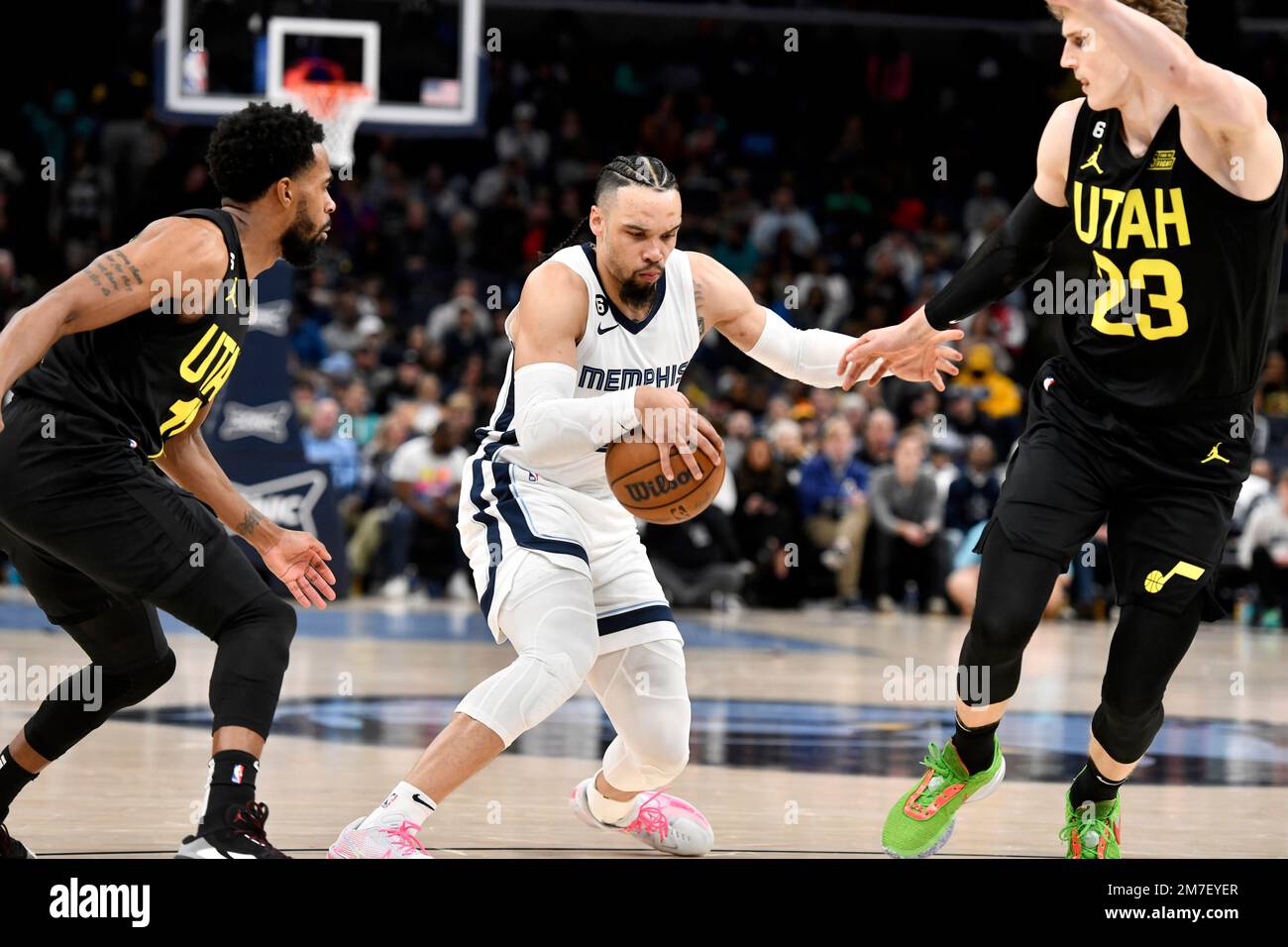 Memphis Grizzlies forward Dillon Brooks handles the ball between Utah